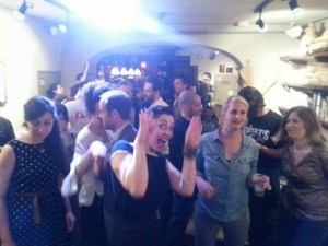 Happy dancing crowd with lovely Vicky in front.